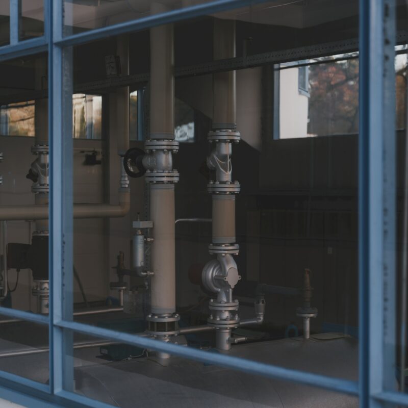 A machined steel flange with a gasket seated in the groove, representing precise documentation and knowledge retrieval in Alberta energy operations