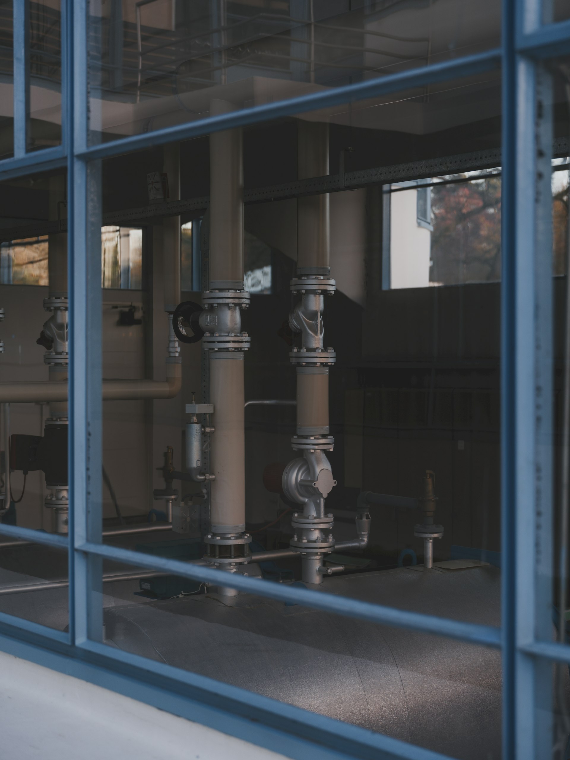 A machined steel flange with a gasket seated in the groove, representing precise documentation and knowledge retrieval in Alberta energy operations