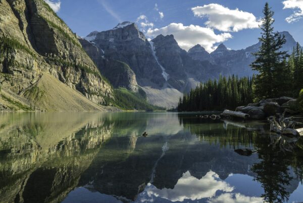 The Canadian Rockies at golden hour, representing the distinct Canadian regulatory and funding landscape for AI adoption