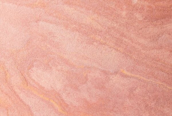 A close-up of Alberta sandstone texture, representing the province's AI infrastructure buildout and what it means for local business