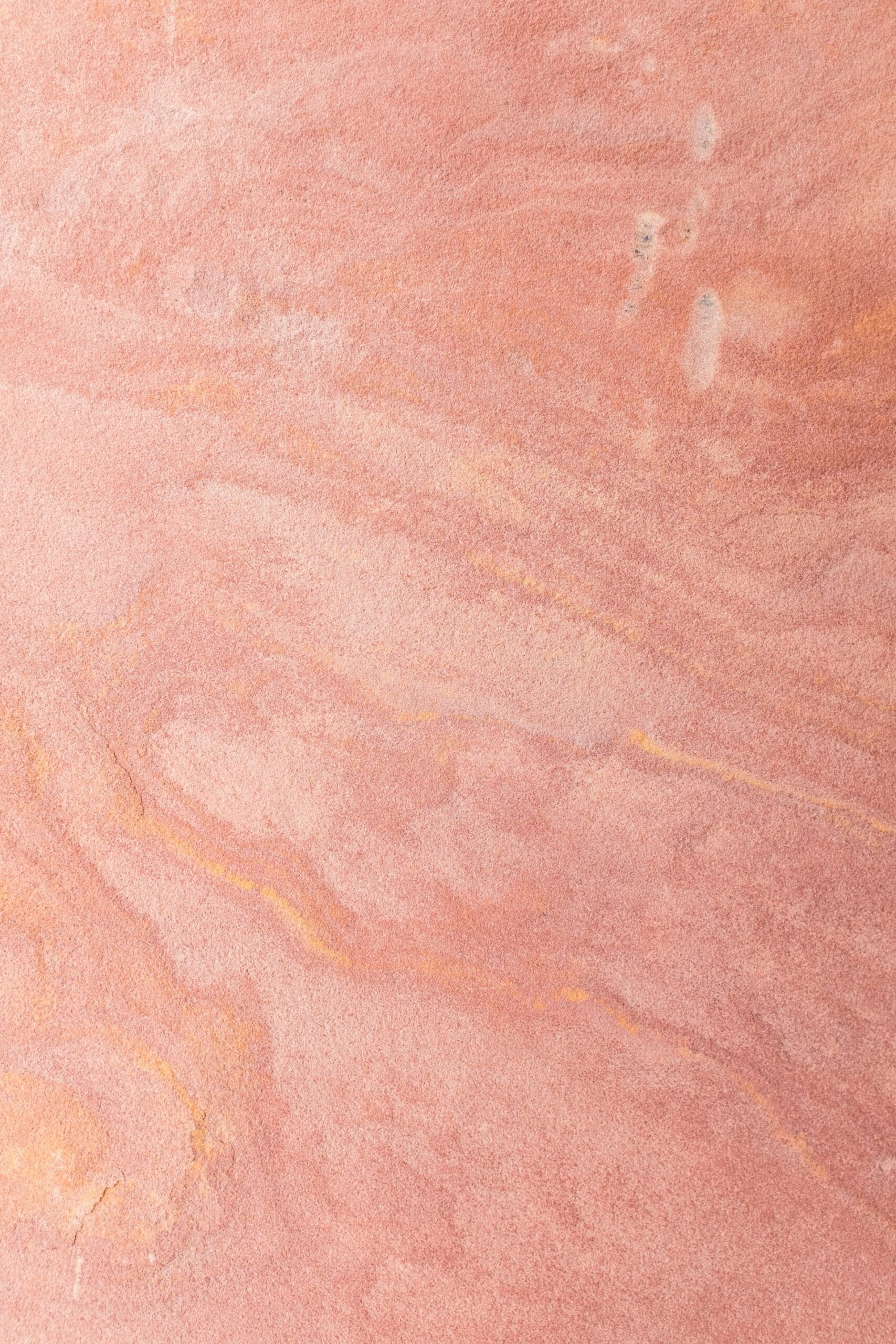 A close-up of Alberta sandstone texture, representing the province's AI infrastructure buildout and what it means for local business