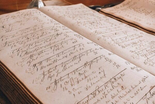 A vintage ledger book open on a desk, representing the financial scrutiny a CFO applies to an AI spending proposal