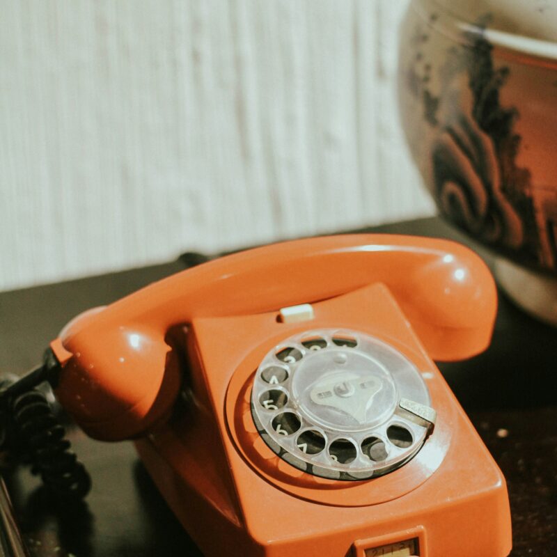 A vintage rotary telephone on a desk, representing the first practical AI automations worth building for a sales team