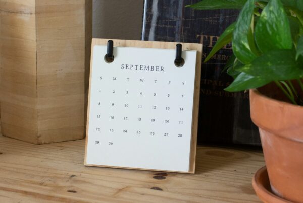 A vintage desk calendar, representing the honest mid year checkpoint for reviewing AI spending and results