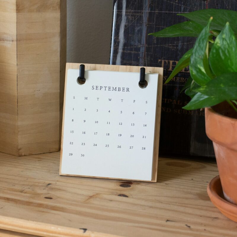 A vintage desk calendar, representing the honest mid year checkpoint for reviewing AI spending and results