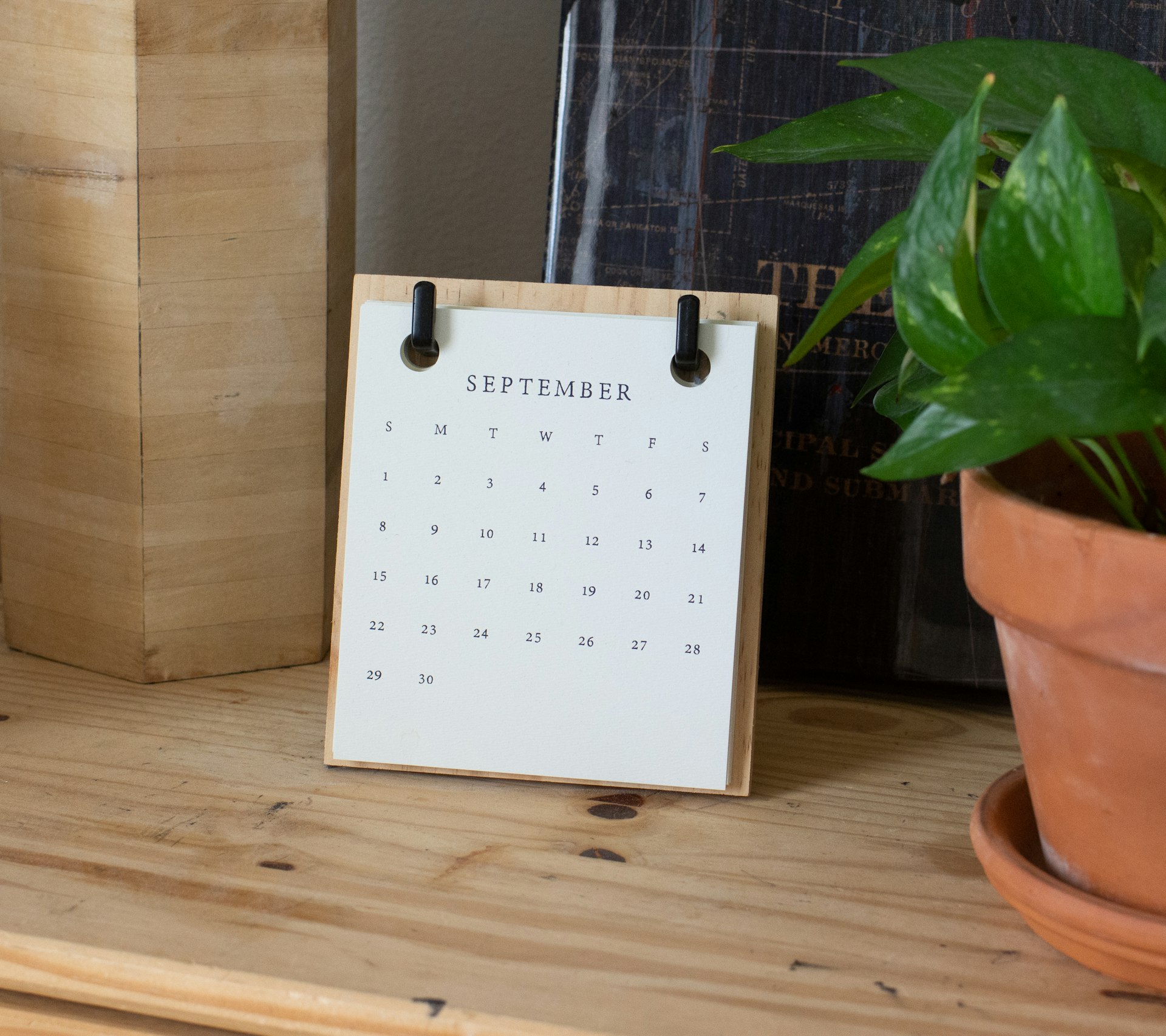 A vintage desk calendar, representing the honest mid year checkpoint for reviewing AI spending and results