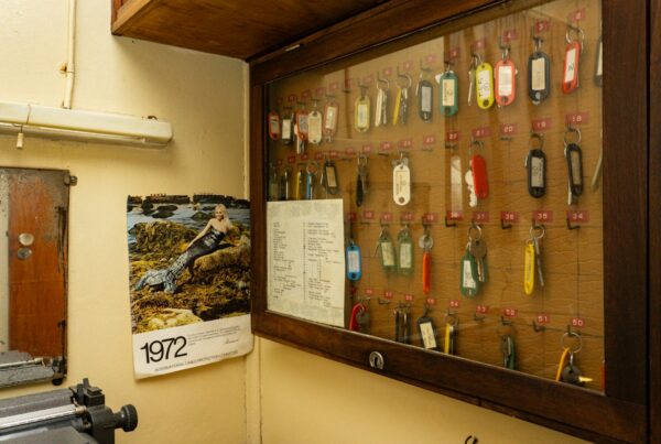 Board of labelled keys on hooks, illustrating AI agent permissions