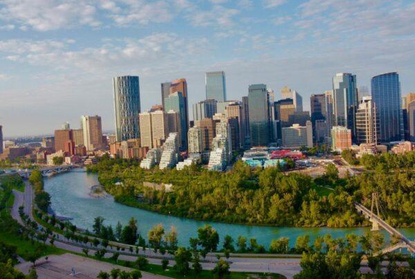 The Calgary skyline above the Bow River in autumn