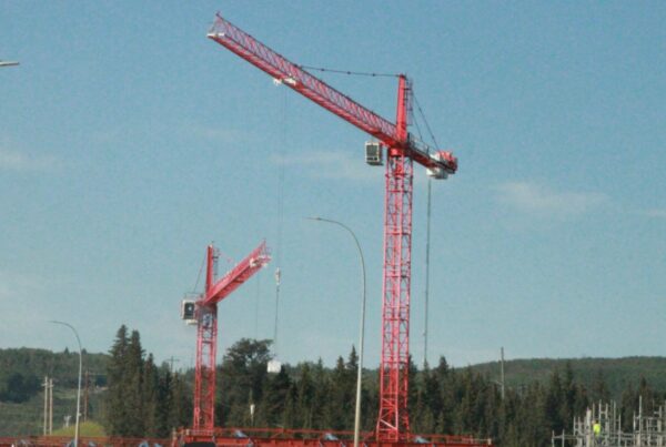Construction cranes over a building site