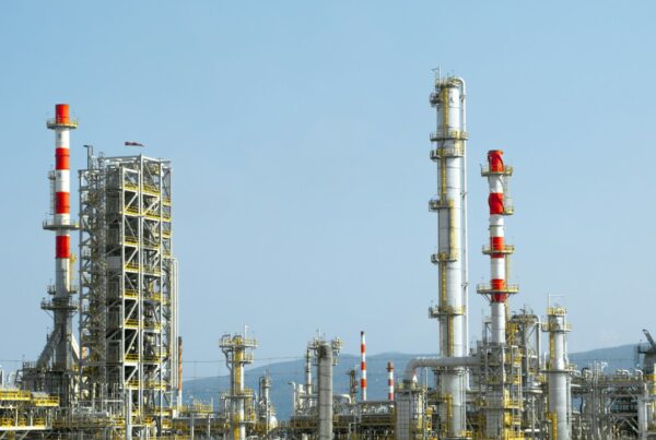 Pipes and towers at an energy processing facility